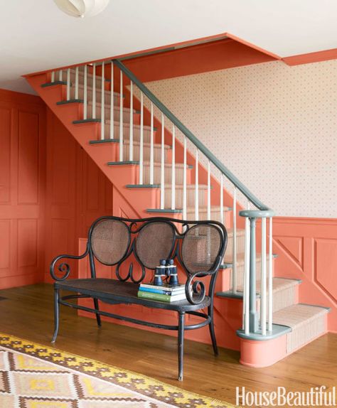 f you're worried that pink may be too sweet and orange too much of a risk, try landing in the middle. Rarely used, a vibrant shade of salmon is an unexpected choice that somehow totally works. The earthiness gives it warmth, while the vibrancy keeps things fresh. Orange Entryway, Benjamin Moore Linen White, Modern Paint Colors, New England Farmhouse, Yellow Tile, Foyer Design, Beautiful Outdoor Spaces, This Old House, Green Sofa