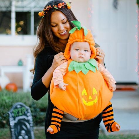 Pin for Later: 42 Adorable Halloween Costumes For Baby-Wearing Parents Pumpkin Funny Baby Halloween Costumes, Baby Carrier Costume, Baby Pumpkin Costume, Baby Boy Halloween, Baby Halloween Outfits, Pumpkin Halloween Costume