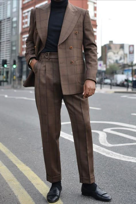 This is a Brown Double Breasted Windowpane Suit worn with a black turtleneck underneath. This outfit can be worn to a wedding, party, and even around casually. If you want a custom suit like this made for you, book an appointment with us at Giorgenti New York! #suit #mensfashion #gentlemen #mensstyle Mens Turtleneck Suit, Brown Suit With Turtleneck Men, Suit Shirts Men, Turtleneck Suit Men, Black And Brown Suit, Brown Suit Men, Chocolate Brown Suit, Vintage Brown Suit, Turtleneck Suit