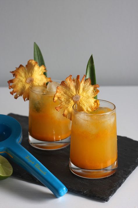 Volstead Act: a #mocktail made with pineapple juice, lime juice, ginger syrup, turmeric, and club soda. Pineapple Drink Garnish, Pineapple Garnish Cocktails, Cocktail Garnishes Unique, Drinks Garnish Ideas, Juice Serving Ideas, Mocktail Pineapple, Drink Garnish Ideas, Pineapple Mocktails, Pineapple Garnish