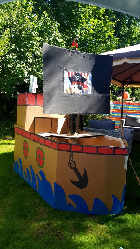 Pirate Boat Diy, Cardboard Box Boats, Diy Cardboard Playhouse, Cardboard Pirate Ship, Pirate Themed Birthday Party, Playhouse Ideas, Sunken Ship, Cardboard Playhouse, Pirate Themed Birthday