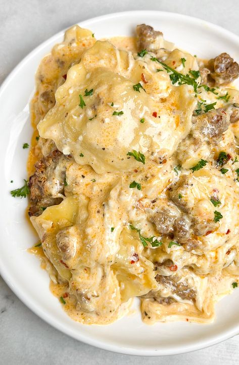 Sausage Alfredo Ravioli Lasagna Alfredo Ravioli, Sausage Ravioli, Easy Weeknight Recipes, Sausage Alfredo, Baked Chicken Spaghetti, Spicy Italian Sausage, Batch Baking, Family Favorite Recipes, Ravioli Lasagna