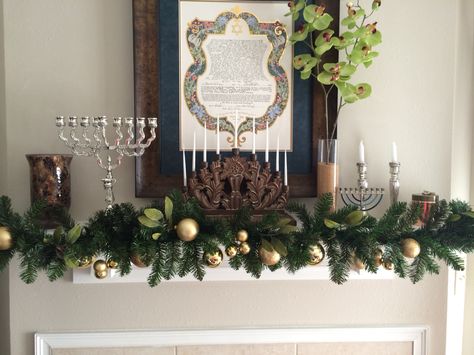 My Hanukkah decoration on our fireplace mantle this year! My menorah's go great with my ketubah.. Chanukah Mantle Decor, Hanukkah Mantel Decorations, Christmas And Hannukah Together, Menorah Decor, Hanukkah Mantle Decor, Hanukkah Garland, Hanukkah Tree, Hannukah Decoration, Channukah Decorations