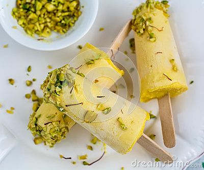 Kulfi also spelled khulfi or qulfi is a popular frozen dairy dessert from the Indian Subcontinent. It is often described as traditional Indian Subcontinent ice cream. Malai Kulfi Recipe, Malai Kulfi, Mango Kulfi, Icee Recipe, Kulfi Recipe, Dairy Desserts, Recipes In Tamil, Indian Desserts, Frozen Treat