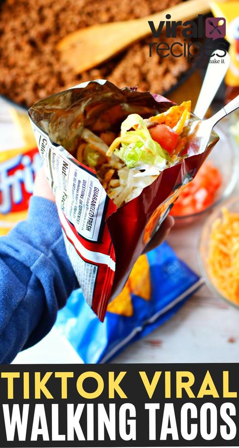 Walking Tacos with Doritos or Fritos, a delicious Mexican night with taco toppings all served in a snack size chip bag. Easy viral with over 45 million views and 3.5 million hearts - This quick meal with a short cook time of 15 minutes is all you need. Just grab mini bags of corn chips and bowls of toppings for a customized Taco Tuesday that everyone will love! #walkingtacos #tacorecipe @EasyViralRecipes #viralrecipes #tiktokRecipes Dorito Nachos In A Bag, Fritos Taco Bowls, Mexican Chips, Dorito Chip, Fritos Corn Chips, Brisket Tacos, Taco Toppings, Viral Recipes, Mexican Night