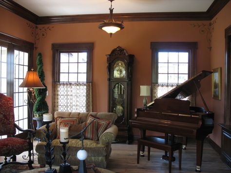 Dark wood trim and grey walls, love it  And so classy, antiqued, but modern too… Painting Wood Trim, Dark Wood Trim, Dining Room Paint Colors, Dark Trim, Dining Room Paint, Living Room Orange, Yellow Living Room, Room Paint Colors, Retro Interior