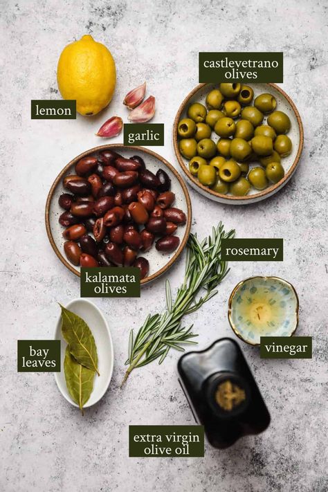 Quick and simple marinated olives are an easy party appetizer or light snack before the main meal! Gently heat high quality extra virgin olive oil on a stove top with garlic, rosemary, vinegar, and fresh citrus. Pour over mixed olives, the marinate for 1 hour. V, GF, DF #wellseasonedstudio #olives #marinatedolives #oliveoil #snack Olive Appetizer, Fresh Olives, Flavored Olive Oil, Marinated Olives, Italian Olives, Olive Recipes, Olive Relish, Party Appetizers Easy, Light Snacks