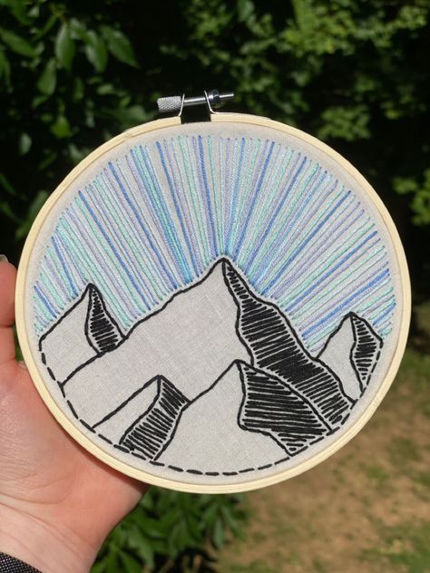 Blue mountain sunrise sunset embroidery hoop design #embroidery #embroideryart #embroiderydesign #embroideryartist #mountains #crossstitch #blue #sunrise #walldecoration wall art gift idea decor Mountain Range Embroidery, Alaska Embroidery, Sunrise Embroidery, Sunset Embroidery, Mountain Embroidery, Blue Sunrise, Embroider Ideas, Mountain Sunrise, Feather Embroidery