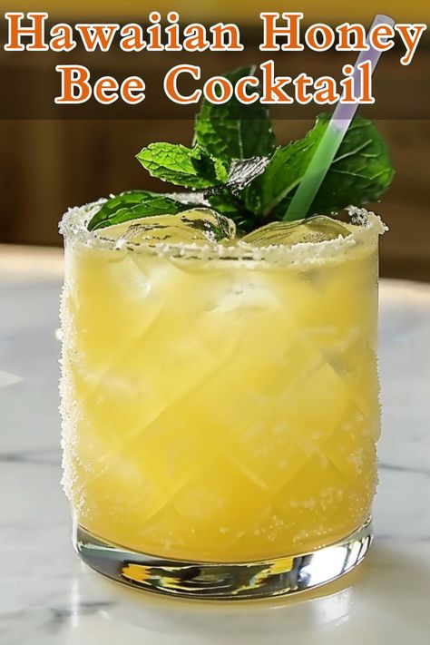 The Hawaiian Honey Bee Cocktail is a delightful tropical drink that combines the smoothness of light rum with the bold kick of overproof rum. Honey Bee Cocktail, Bee Cocktail, Summer Rum Cocktails, Dark Rum Cocktails, Rum Cocktails Easy, Honey Cocktail, Cocktails To Make At Home, Rum Cocktail Recipes, Pineapple Chunks