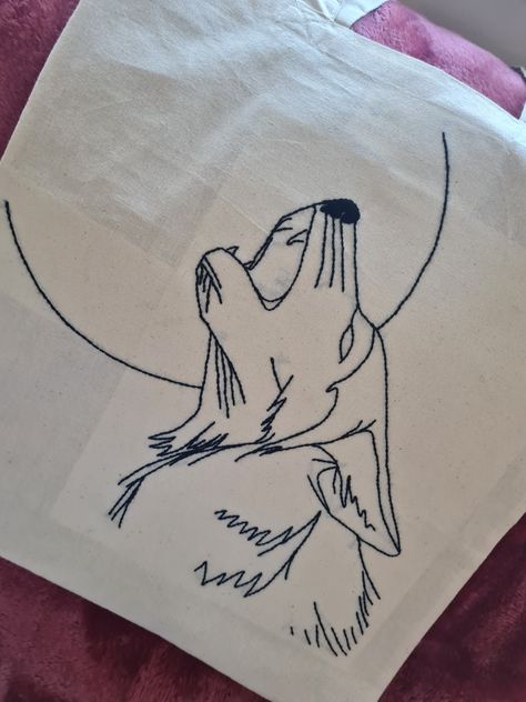 Hand embroidered tote bag. Design is a wolf howling in front of a big moon. Wolf Embroidery Pattern, Wolf Bookmark, Embroidery Wolf, Hand Embroidered Tote Bag, Wolf Embroidery, Wolf And Moon, Wolf Howling At The Moon, Embroidery Shirts, Moon Wolf