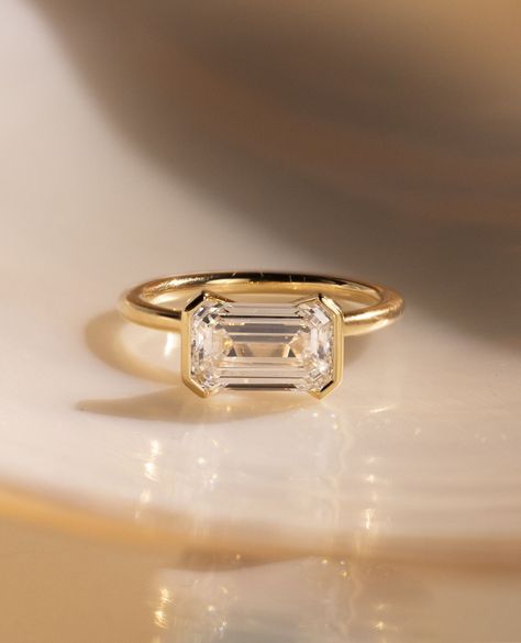 Obsessed is an understatement. 

The step-cut facets, half-bezel & 2ct stone = Perfection✨️

Ring Details:
Jodie - Emerald Half Bezel Solitaire
2ct | D | VS1 Promise Ring For Girlfriend, Half Bezel Engagement Ring, Promise Rings For Girlfriend, East West Ring, Ring For Girlfriend, Half Bezel Setting, Most Popular Engagement Rings, Half Bezel, Popular Engagement Rings