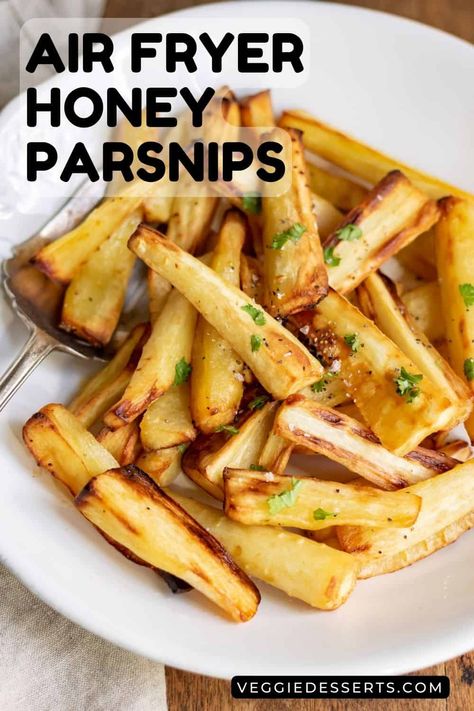 Air Fryer Parsnips are a delicious and healthy alternative to french fries or an easy side dish! These honey-roasted parsnips are cooked in the air fryer and come out perfectly crispy on the outside and tender on the inside, with minimal oil. They are naturally sweet like a carrot, making them the perfect side dish for any meal. Air Fryer Parsnip Fries, Air Fryer Roast Parsnips, Air Fryer Roasted Carrots And Parsnips, Parsnips In Air Fryer, Parsnip Fries Air Fryer, Parsnip Recipes Air Fryer, Air Fryer Parsnips, How To Cook Parsnips, Airfryer Ideas