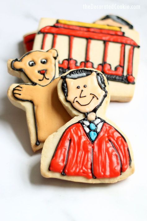 How to decorate Mr. Rogers' Neighborhood cookies!  #cookiedecorating #DecoratedCookies #Royalicing #SugarCookies #MrRogersNeighborhood Marshmallows On A Stick, Mr Rogers Neighborhood, 1rst Birthday, Neighborhood Park, Star Wars Cookies, Neighborhood Party, Halloween Party Food, Mister Rogers Neighborhood, Black Food Coloring