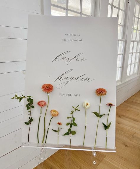 Garden Theme Welcome Sign, Welcome Sign With Real Flowers, Welcome Wedding Sign Flowers, May Spring Wedding, Wedding Chapel Entrance Decor, Flower Petal Welcome Sign, Welcome Sign Wedding With Flowers, Wedding Table Setting Minimal, Wedding Welcome Flowers