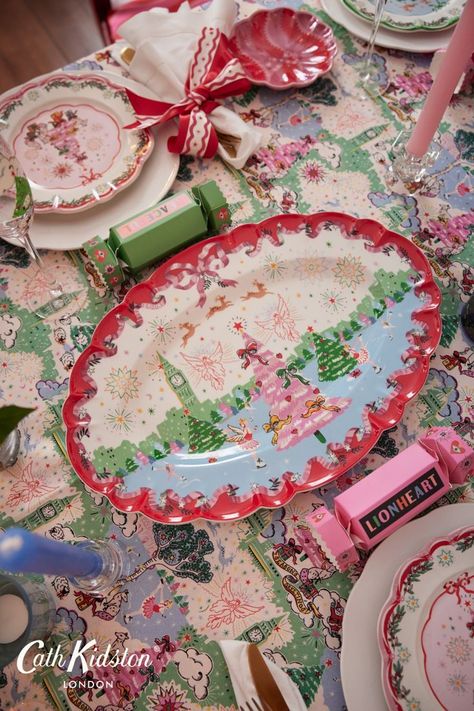 Give your mince pies or Christmas cake centre stage on our festive scalloped platter. Featuring a magical scene from our Christmas hand-painted print. It’s made from sturdy stoneware and has a dainty red scalloped edge and a pink grosgrain ribbon framing the joyful scene. Many more homeware items in the same collection are available so you can create your perfect table for this season’s festivities. Colorful Tablescapes, Fancy Holiday Party, Cath Kidston Christmas, Christmas Champagne, Chinoiserie Christmas, Christmas Platter, Christmas Brunch, Mince Pies, Christmas Table Settings