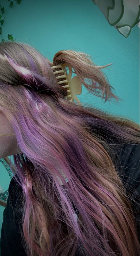 Dirty blond hair with purple hair underneath in a half up half down with the pieces that are held up twisted around the head and held up with a claw clip. Blonde Hair Purple Underneath, Purple Hair Underneath, Purple Underneath Hair, Half Colored Hair, Purple Blonde Hair, Hair With Purple, Hair Dyed Underneath, Pink Hair Streaks, Pink And Purple Hair