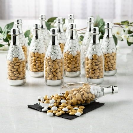 Decorate party tables at your big event or hand out small party favors (sold separately) with these champagne bottle containers.  Material: Plastic.  (4 dz./unit)  Size: 2" x 6" Champagne Centerpiece, Small Party Favors, Adult Birthday Party Favors, Champagne Favors, Best Champagne, Bottle Centerpieces, Party Favors For Adults, Bubble Party, Wine Bottle Corks