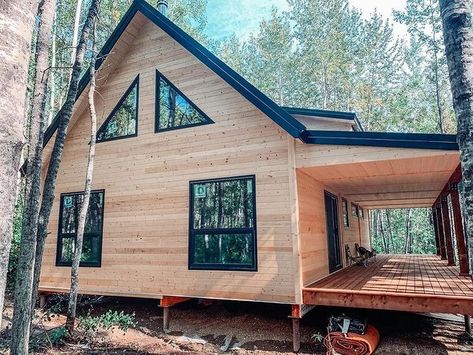 Knotty Pine Cabins | Just framed. Custom 24’x42’ cabin with a side extension and covered deck. Also note the custom black windows from our friends… | Instagram Black Windows Log Cabin, Cabin With Lots Of Windows, Cabin With Large Windows, Log Cabin With Black Metal Roof, Cabin With Big Windows, Knotty Pine Cabin, White Cabin, Pine Cabin, Log Cabin Exterior