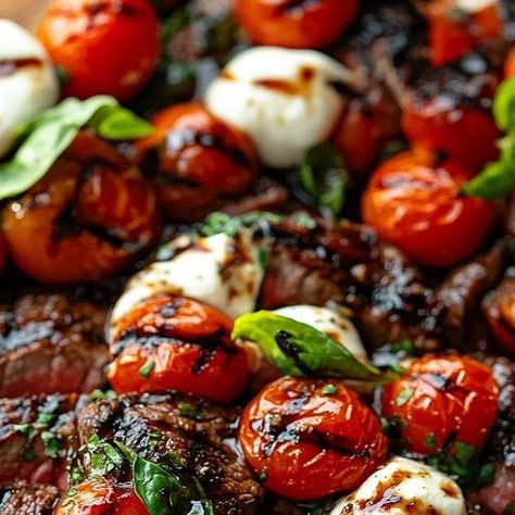 miarecipes on Instagram: "Grilled Steak Caprese with Balsamic Marinade Ingredients: For the Balsamic Marinade/Dressing: 1/4 cup balsamic vinegar 🍷 1/4 cup extra virgin olive oil 🫒 1 tablespoon Dijon mustard 🟡 1 teaspoon honey 🍯 1 large clove garlic, minced or grated 🧄 1/4 teaspoon salt 🧂 1/4 teaspoon black pepper ⚫ For the Steak Caprese: 2 pounds flank steak 🥩 2 cups cherry or grape tomatoes 🍅 1 cup fresh mozzarella, diced 🧀 2 tablespoons fresh basil, thinly sliced 🌿 Directions: 1️⃣ Prepare the Balsamic Marinade/Dressing: In a small bowl, combine the balsamic vinegar, olive oil, Dijon mustard, honey, minced garlic, salt, and pepper. Mix well until fully combined. 🍶 2️⃣ Marinate the Steak: Place the flank steak in a shallow dish and pour half of the marinade over it, ensuring the Steak Caprese, Balsamic Marinade For Steak, Tuscan Dishes, Balsamic Dressing Recipe, Marinade Flank Steak, Balsamic Marinade, Grilled Flank Steak, Grilled Tomatoes, Marinated Steak