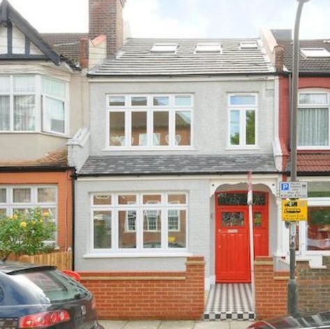 LOVE: grey painted brick + same colour on pebbledash. PLUS original style tiling on path. not sure about red door - navy blue/dark grey would work? Grey Pebbledash House, Pebbledash Makeover, Pebbledash House, Blue Grey Exterior House Colors, Painted Pebbledash, London House Exterior, Grey Painted Brick, 1930s House Exterior, 1930s Doors