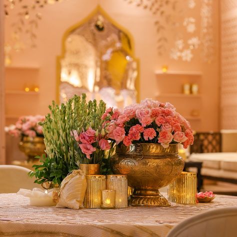 A Royal Indian Wedding with grand floral arrangements, silver oxidised accessories and pastel shades of pink brought this abundance to life. Decor & Production: @showkraftdesignerweddings Florals: @prakartibypragya Lighting: @lightingbytechnocraft Location: @grandhyatt.gurgaon Shot By: @sandeepmunjalphotography #royalwedding #destinationwedding #showkraftdesignerweddings #pastels #pinks #florals #weddingdesign #grandhyattgurgaon #wedding Indian Wedding Table Decor, Pastel Floral Arrangements, Royal Indian Wedding, Royal Indian, Indian Pink, Wedding Table Decor, Table Arrangements, Pastel Shades, Pastel Floral