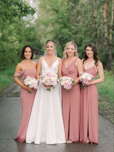 We love the dusty rose colour of these bridesmaid’s dresses and how perfect they look with the blush and white bouquets! The bouquets feature peonies, garden roses, sweet peas and ranunculus! 📷 @miltonphoto #dustyrosewedding #dustypink #bridesmaidsdresses #peonybouquets #whiteoharagardenroses #blushpeonies #peonywedding #calgary #calgarywedding #flowersbyjanie #springweddingdress #springwedding #junewedding Bridesmaid Dusty Rose Dresses, Peony Bridesmaid Dresses, Dusty Rose Pink Bridesmaid Dresses, Dusty Rose Bride Bouquet, Dusty Rose Dress Bridesmaid, Dusty Pink Bridesmaid Dress, Blush Pink Bridesmaid Dresses Dusty Rose, Bridesmaid Dresses Pink Blush, Rose And Blush Wedding