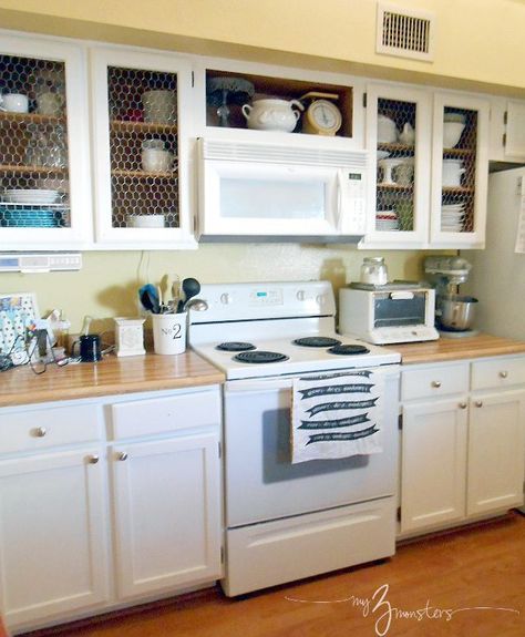 After: Chicken Wire Cabinet Facelift Cabinet Facelift, Painted Pantry Doors, Chicken Wire Cabinets, Diy Kitchen Cabinets Makeover, Diy Kitchens, Cabinets Makeover, Kitchen Diy Makeover, New Kitchen Cabinets, Kitchen Cabinets Makeover