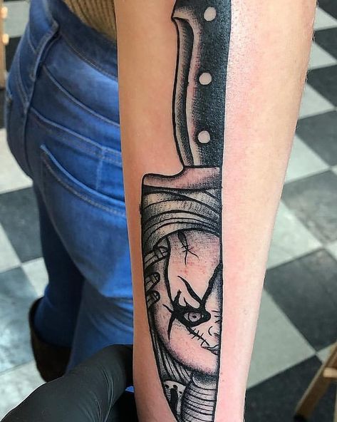 Chucky horror knife tattoo  Done by @coreehunt on Instagram. Chuckie Tattoo, Chucky Tattoo For Women, Chucky Knife Tattoo, Chucky And Tiffany Tattoo Couple, Tiffany Tattoo Chucky, Chucky Tattoos, Chucky Tattoo Ideas, Small Chucky Tattoo Ideas, Chucky And Tiffany Tattoo