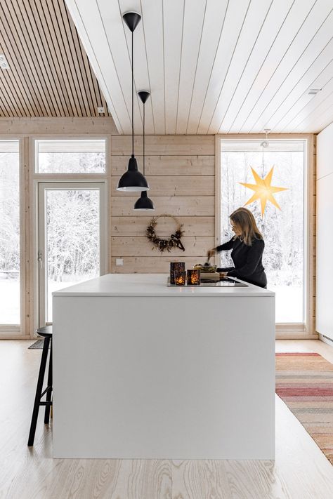 Unique, one-storey log house designed by architect – this is the modern home of Laura, Petri and children - Honka Modern Log House Interior Design, Log Home Modern, Modern Chalet Kitchen, Nordic Cottage Interior, Log House Kitchen, Small Scandinavian House, Holiday Home Interiors, Log House Interior, Modern Cabin Kitchen