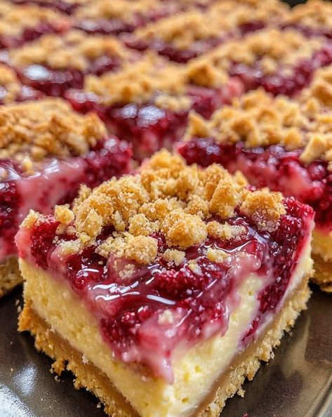 Discover the perfect blend of tangy lemon, sweet raspberries, and a crunchy cheesecake base in these irresistible no-bake bars. #Dessert #LemonRaspberry #CheesecakeBars Lemon Raspberry Cheesecake Bars, Cheesecake Crunch, Raspberry Lemon Bars, Crunch Bars Recipe, Lemon Raspberry Cheesecake, Beer Bread Easy, Raspberry Cheesecake Bars, Raspberry Bars, Crunch Bars