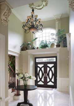 Love the details & ledge above this front door! And the ceiling medallion, corbels, trim around door openings... - Interior Details | Creative Design Construction & Remodeling Bedroom Ledge Decorating Ideas, Foyer Window Ideas, Above Door Shelf Decor, Nook Above Front Door, Plant Ledge Decorating Ideas, Ceiling Ledge Decor Ideas, High Ledge Decorating Ideas Living Rooms, Above Front Door Decor, Foyer Ledge Decorating Ideas