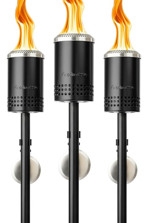 The Solo Stove fire pits have crossed over into the tiki torch realm with these sleek, cold-rolled steel staked torches that produce huge flames. 🔥 Stainless Steel Fire Pit, Solo Stove, Ultimate Backyard, Backyard Parties, Raised Flower Beds, Steel Fire Pit, Light The Way, Tiki Torches, Scented Oils