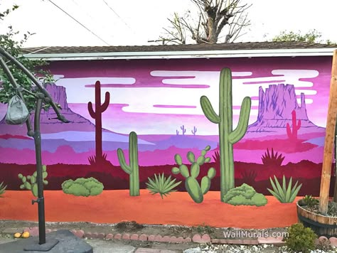 Desert wall mural on exterior garage wall Cowboy Mural Wall Art, Mural On Metal Building, Backyard Wall Mural, Desert Mural Wall, Outdoor Murals Backyards, Outdoor Wall Painting Ideas, Fence Mural Ideas Backyards, Painted Fences Mural, Outdoor Wall Murals Backyards