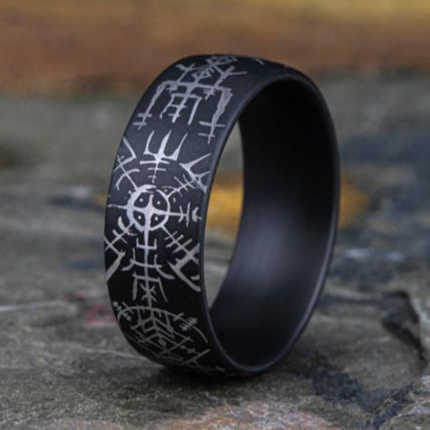 "The Viking" is an 8mm wedding band that embodies the spirit of adventure and exploration. With a comfort fit, it ensures a snug and comfortable feel on your finger throughout the day. This distinctive wedding band features darkened tantalum, which adds a sense of mystery and depth to its design. The standout feature is the Viking compass pattern, symbolizing navigation and direction, making it a meaningful choice for couples who appreciate both style and symbolism. "The Viking" is not just a sy Norse Wedding, Compass Pattern, Compass Wedding, Viking Ring, Jared The Galleria Of Jewelry, Jewelry Appraisal, How To Clean Metal, Stylish Mens Outfits, Size 10 Rings