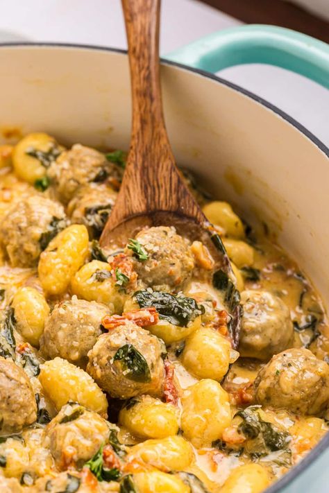 Meatballs and gnocchi are an easy one pan dinner with a creamy sundried tomato sauce, fresh spinach, and parmesan cheese. Easy to make and clean up! Creamy Meatballs, Sundried Tomato Sauce, Baked Italian Sausage, Easy One Pan Dinner, Spinach Gnocchi, Spinach Meatballs, Italian Style Meatballs, Spinach Sauce, Frozen Beef