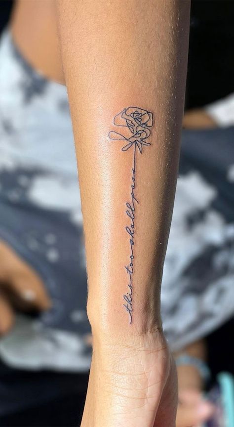 Word Tattoos For Women With Flowers, Woman's Forearm Tattoo Ideas, Side Arm Wrist Tattoo, Text Flower Tattoo, Words With Flowers Around It Tattoo, Meaningful Tattoo Ideas For Women Arm, Tattoo Ideas For Wrist For Women, Forearm Tattoo Women Meaningful, Woman Wrist Tattoo Ideas