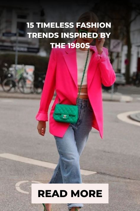 Woman walking down the street wearing a bright pink blazer and blue jeans, epitomizing 1980s fashion with a modern twist. 1980s Blazer Outfit, Puffed Sleeves Outfit, Modern 80s Outfits, 1980 Fashion Trends, The 80s Fashion, 80s Inspired Outfits, Leg Warmers Outfit, 1980s Fashion Trends, 1980 Fashion