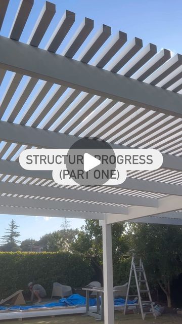 Bonnie Stacey on Instagram: "STRUCTURE PROGRESS 🛠️ 

Battens are on ✔️ 

We designed a timber batten structure with a clear polycarbonate roof, that would still let some light in ☀️ while providing cover from the rain ☔️ 

this was our alternative to louvres which unfortunately were out of our budget (quotes ranged from $50-60k for the structure alone) 

this structure will cost us about half the price in comparison 💰 

next will be the polycarbonate roof sheeting which will be installed on a gradient for the rain to run off 🌧️ 

follow along to see how it turns out! 

#landscapedesign #diytips #landscapedesigner #patio #alfresco #pergola #outdoorliving #structure" Alfresco Pergola, Budget Quotes, Polycarbonate Roof, Timber Battens, Landscape Designer, Roofing Sheets, Roof Design, The Rain, Landscape Design