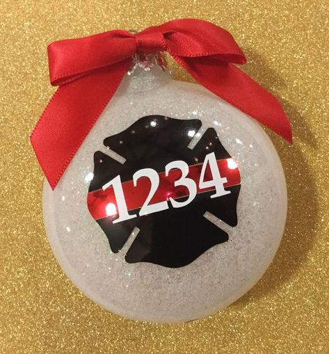 80mm plastic disc custom firefighter ornament, filled with silver, white, or gold glitter. Customize with badge number, no extra charge! Specify badge number or department initials in message to seller at checkout. Firefighter Ornament, Ornaments Vinyl, Police Christmas Ornaments, Firefighter Christmas Gifts, Fire Department Christmas, Fireman Decor, Holiday Ornaments Diy, Firefighter Crafts, Christmas Tree Ornament Crafts