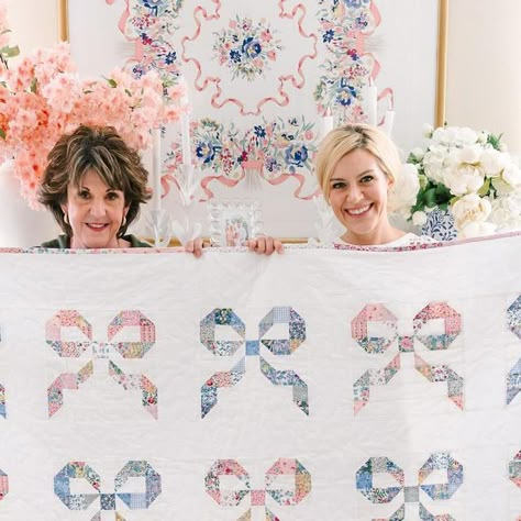 megan louise 🎀 on Instagram: "my dream bow quilt is here!!! 🎀🎀🎀 three years ago my beautiful and talented mother offered to make me a quilt. I picked out some liberty fabrics then for the next two years could not decide on a pattern 🫣🫠. finally earlier this year I fell in love with the idea of alternating pink and blue liberty bows and it felt perfect! 🎀 my mom designed the quilt using a bow block pattern I found and loved, added some fabrics from her own stash and spent so much time and love making it for me 🫶🏻 I’m very particular and my saint of a mother consulted with me on every step to make it exactly how I envisioned! I could not love it more and it is beyond special 🤍🎀 thank you so much @mygossamerlife!! 🫶🏻😘😘 #quilting #quilt #bowquilt #libertyquilt #libertyfabric #bo Girly Quilt Patterns, Bow Quilt Pattern, Bow Quilt Block, Pink Quilts Ideas, Pink And Blue Quilt, Pink And Blue Nursery, Bow Quilt, Small Quilting Projects, Ribbon Quilts