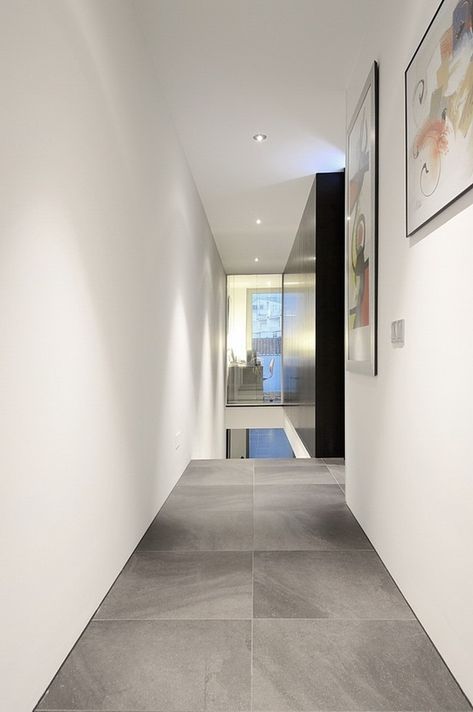 Old Town House by Mario Martins Atelier House Interior Concrete Floor, Modern House Concrete Floor, No Skirting Boards, No Baseboards Ideas, No Skirting Boards Ideas, Simple Modern Baseboard, Concrete Floor Baseboard, Skirting Board Ideas Modern, Minimal Baseboard