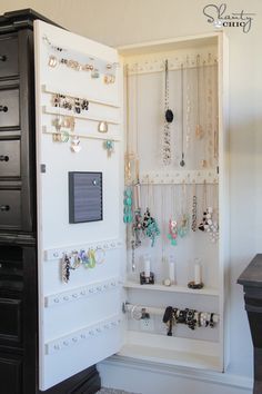 This doubles the hang space with the door. Use hidden hinges though, could be made any size to fit any space Aveeno Lotion, Jewerly Organizer, Jewelry Storage Diy, Diy Organizer, Organizer Diy, Shanty 2 Chic, Diy Jewelry Holder, Diy Jewelry Inspiration, Jewelry Organizer Diy