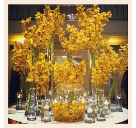 Yellow orchids Yellow Event Decor, Yellow Orchids Centerpiece, Yellow Wedding Centerpieces, Yellow Centerpieces, Yellow Wedding Theme, Yellow Orchid, Yellow Theme, Gold Wedding Decorations, Flower Installation