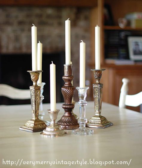 Mix matched candlesticks Crystal Candlesticks Wedding, Candlestick Display, Antique Decorations, Backyard Decorations, Stick Decor, Quick Wedding, Here There And Everywhere, Candlestick Centerpiece, Candle Stick Decor