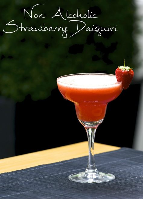 non alcoholic strawberry daiquiri mocktail recipe perfect for a romantic valentines day drink, or for the summer time Non Alcoholic Strawberry Daiquiri, Summer Mocktail Recipes, Strawberry Daiquiri Recipe, Easy Mocktail Recipes, Daiquiri Recipe, Romantic Valentines Day, Non Alcoholic Cocktails, Alcoholic Cocktails, Strawberry Daiquiri