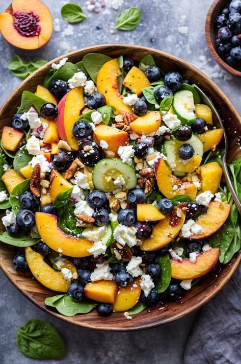 Fresh and vibrant Blueberry Peach Feta Salad perfect for summer! A delightful mix of sweet fruit and tangy cheese. Easy, healthy, and delicious! #SummerSalad #HealthyEats #FruitSalad #QuickRecipe #FreshFlavors Pretty Salad Recipes, Blueberry Peach Feta Salad, Peach Feta Salad, Summer Picnic Food Ideas, Refreshing Dessert Recipes, Summer Salad Ideas, June Recipes, Salad With Fruit, Light Lunches