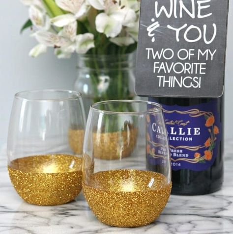 Glitter Dipped Wine Glasses and Wine Bottle Gift Tags Glitter Dipped Wine Glasses, Craft Night Projects, Wine Bottle Gift Tags, Cricut Cups, Dishwasher Safe Mod Podge, Glitter Mug, Community House, Bottle Gift Tags, Glitter Wine Glasses