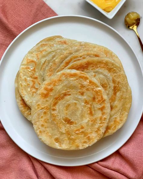 Paratha Recipe (Flaky South Asian Flatbread) | Kitchn Garlic Paratha, Paratha Bread, Daniel Plan, Paratha Recipe, Roti Recipe, Flat Breads, Indian Subcontinent, Breaking Bread, Yeast Breads