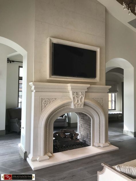 Master Bedroom Carved Stone Fireplace Surround with Over-Mantel and Moulding Surround at TV in Cream Limestone Tv Over Mantel, Fireplace Stone Ideas, Cast Fireplace, French Fireplace Surround, Fireplace Focal Point, Stone Fireplace Mantles, Travertine Fireplace, Stone Fireplace Mantle, Wood Burning Stove Ideas