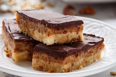 Classic Tom Thumb Bars Recipe: An Old-fashioned Chewy Coconut Toffee Cookie Bar Recipe From the 1930s | Cookies | 30Seconds Food Kit Kat Dessert, Toffee Cookie Bars, Esterhazy Torte, Coconut Toffee, Toffee Bars Recipe, Toffee Bar, Dates Chocolate, Lemon Pie Recipe, Cinnamon Roll Bread